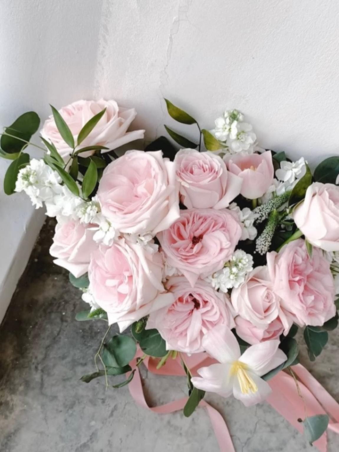 Adoria romantic · round bridal bouquet in blush, ivory, white and soft green — close-up